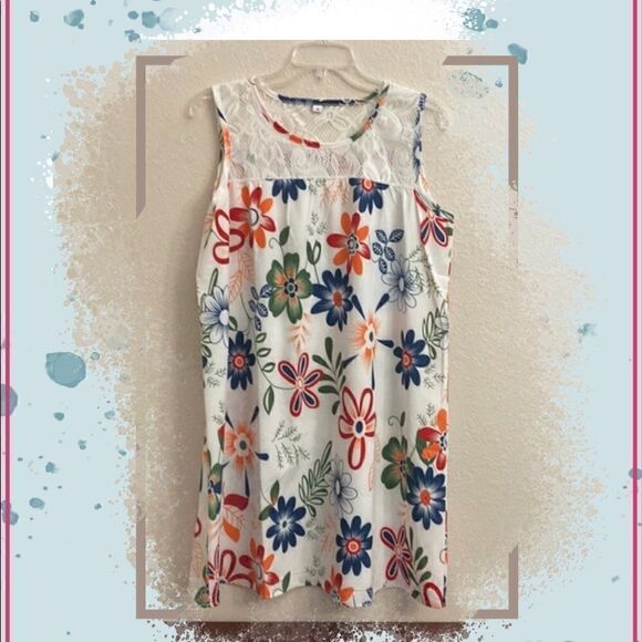 🌸🌺🌸A white dress with colorful floral design the  top and back lace design!! - Picture 1 of 6